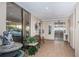 A community lobby featuring tiled floors, seating and an elevator at 841 4Th N Ave # 21, St Petersburg, FL 33701