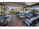 Relaxing outdoor patio with comfortable furniture, providing a perfect spot to enjoy the neighborhood ambiance at 841 4Th N Ave # 21, St Petersburg, FL 33701
