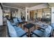 Inviting outdoor lounge area with plush seating and brick flooring, perfect for relaxation and social gatherings at 841 4Th N Ave # 21, St Petersburg, FL 33701