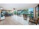 Bright sunroom with tile floors, large windows, and comfortable seating for relaxation and enjoyment of natural light at 841 4Th N Ave # 21, St Petersburg, FL 33701