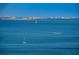 Scenic water view with sailboats and a motorboat under a vast, open sky at 841 4Th N Ave # 21, St Petersburg, FL 33701