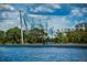 Unique waterfront public art display on the water's edge and near green trees at 841 4Th N Ave # 21, St Petersburg, FL 33701
