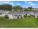 Aerial view of the backyard with lush lawn at 913 Augusta Dr, Sun City Center, FL 33573