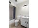 Bathroom featuring a shower, toilet, and sink at 913 Augusta Dr, Sun City Center, FL 33573