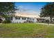 Well-maintained lawn and attractive landscaping highlight the exterior of these lovely homes at 913 Augusta Dr, Sun City Center, FL 33573