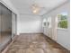 Enclosed Florida room featuring tile floors and multiple windows at 913 Augusta Dr, Sun City Center, FL 33573