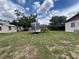 Vast backyard with a trailer, shed, and ample space for recreation and gardening at 9218 N 52Nd St, Tampa, FL 33617