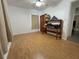 Bedroom with wood floors, closet and ceiling fan at 9218 N 52Nd St, Tampa, FL 33617