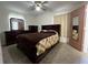 Bedroom with coordinating furnishings and a ceiling fan provides a relaxing atmosphere at 9218 N 52Nd St, Tampa, FL 33617