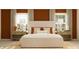 Relaxing bedroom with soft lighting, neutral tones, and comfortable bedding at 9364 Bonita Mar Dr, Parrish, FL 34219