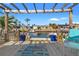Waterfront deck with canal view, ideal for outdoor dining and enjoying the beautiful scenery at 9917 San Sierra Way, Port Richey, FL 34668