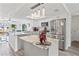 Well-lit kitchen with granite counters and stainless steel appliances at 9917 San Sierra Way, Port Richey, FL 34668