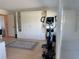 Versatile room with built-in storage and space for an exercise area with an elliptical machine at 100 Bluff View Dr # 114C, Belleair Bluffs, FL 33770