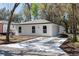 Charming single-story home featuring a well-manicured yard and a concrete driveway that adds curb appeal at 10219 Huntley St, New Port Richey, FL 34654