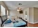 Comfortable bedroom featuring a ceiling fan, and a crib area for a Bedroom setup at 10606 Shady Falls Ct, Riverview, FL 33578
