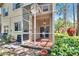 Screened-in patio with lovely light fixture, sliding glass doors and nice back yard at 10606 Shady Falls Ct, Riverview, FL 33578