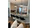 This bright kitchen features a spacious island, pendant lighting, and breakfast bar seating at 10880 Cory Lake Dr, Tampa, FL 33647
