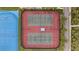 Aerial view of tennis and roller hockey courts illustrating the range of community activities at 10880 Cory Lake Dr, Tampa, FL 33647