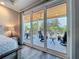 Bedroom with a beautiful view of the outdoor patio and lots of natural light at 1204 Derby Ln, Sarasota, FL 34242
