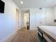 Bright bedroom space showcasing carpet floors and ample closet space at 1204 Derby Ln, Sarasota, FL 34242