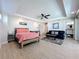Open floor plan with a bedroom, sitting area, and bathroom for a comfortable, integrated living space at 1204 Derby Ln, Sarasota, FL 34242