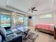 Bright space with access to an outdoor patio overlooking the pool, offering seamless indoor-outdoor living at 1204 Derby Ln, Sarasota, FL 34242