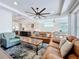 Open-concept living space combining living, dining, and kitchen areas, perfect for modern living and entertaining at 1204 Derby Ln, Sarasota, FL 34242
