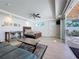 Large main bedroom features a private patio, comfortable seating, and an ensuite bathroom at 1204 Derby Ln, Sarasota, FL 34242