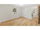 Empty bedroom with wood look floors and a closet at 1206 E Osborne Ave, Tampa, FL 33603