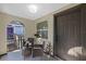 Inviting porch with tiled floor, seating area, and view of the front yard at 1206 E Osborne Ave, Tampa, FL 33603