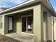 Covered back patio offering an ideal space for relaxation and enjoyment at 15421 Shoal Haven Pl, Ruskin, FL 33573