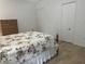 Bright bedroom with tile floors, providing a comfortable retreat at 15421 Shoal Haven Pl, Ruskin, FL 33573