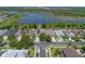 Lovely property enhanced by solar panels, nestled in a lush, vibrant community adjacent to a tranquil lake at 1701 Bonita Bluff Ct, Ruskin, FL 33570