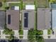 Top-down aerial view of a home with solar panels and well manicured landscaping at 1701 Bonita Bluff Ct, Ruskin, FL 33570