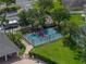 Aerial view of a neighborhood basketball court and surrounding greenery for community enjoyment at 1701 Bonita Bluff Ct, Ruskin, FL 33570