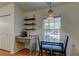 Cozy breakfast nook with coffee bar, a glass top table, and natural light at 17631 Grove View Dr, Lutz, FL 33549