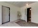 Bright foyer with tile flooring and multiple doorways for easy access and flow at 17631 Grove View Dr, Lutz, FL 33549