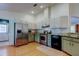 Spacious kitchen with stainless steel appliances, granite counters, and ample cabinet space at 17631 Grove View Dr, Lutz, FL 33549