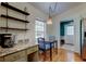 Inviting breakfast nook area with granite countertops and a view from the window at 17631 Grove View Dr, Lutz, FL 33549
