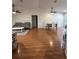 Spacious open floor plan with living, dining, and kitchen areas and lots of natural light at 17631 Grove View Dr, Lutz, FL 33549