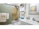 Bathroom with vanity and tiled shower at 1851 Bough Ave # A, Clearwater, FL 33760