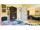 Bedroom with closet and sunflower pattern bedding at 1851 Bough Ave # A, Clearwater, FL 33760