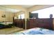 Bedroom featuring mirrored closet and dark wood furniture at 1851 Bough Ave # A, Clearwater, FL 33760