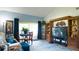 Inviting living area with a media center, comfortable seating, and access to the outdoors at 1851 Bough Ave # A, Clearwater, FL 33760