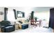 Comfortable living room featuring natural light, seating, and calming decor at 1851 Bough Ave # A, Clearwater, FL 33760