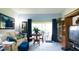 Open concept living room with views of the dining area and screened patio at 1851 Bough Ave # A, Clearwater, FL 33760