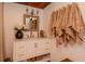 Bathroom with white vanity, modern lighting, and decorative accents at 19209 Crooked Ln, Lutz, FL 33548