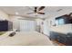 Bedroom featuring wood floors, ceiling fan, and natural lighting at 206 Hillcrest Dr, Safety Harbor, FL 34695