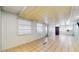 The bonus room features tile flooring, windows, and a doorway to the outside at 206 Hillcrest Dr, Safety Harbor, FL 34695