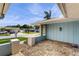 Inviting front porch with paver flooring at 206 Hillcrest Dr, Safety Harbor, FL 34695